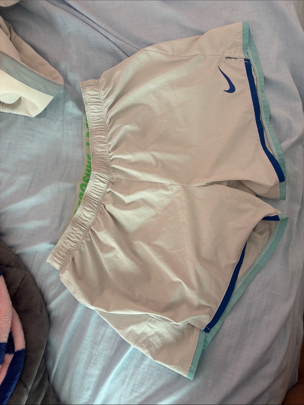 Nike White Running Shorts with Blue and Teal Trim